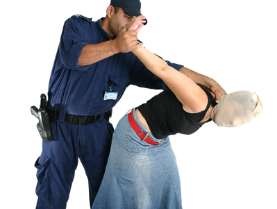 Officer arresting a woman before felony bail bonds in Lazybrook