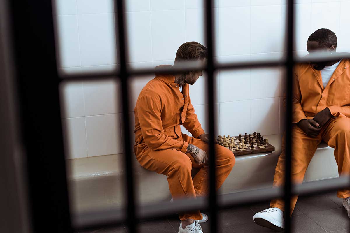 Inmates in a jail cell waiting for a bail bondsman in Allandale