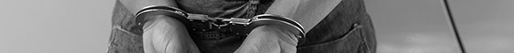 Handcuffed hands for bail bonds in Conroe