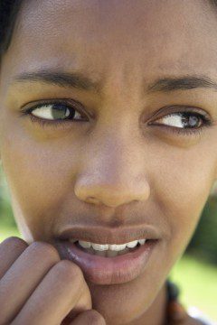 Worried woman considering a non-arrest bail bond in Independence Heights