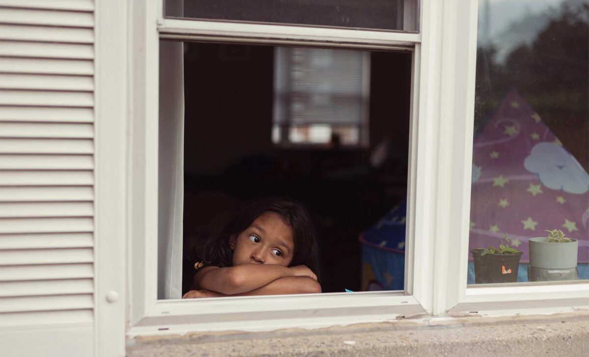 Child at home waiting for a parent's release on bail bonds in Pearland